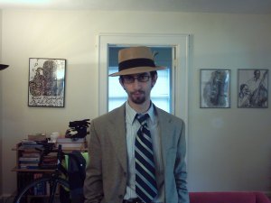 straw had striped tie