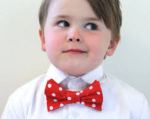 Adorable child with bow tie.
